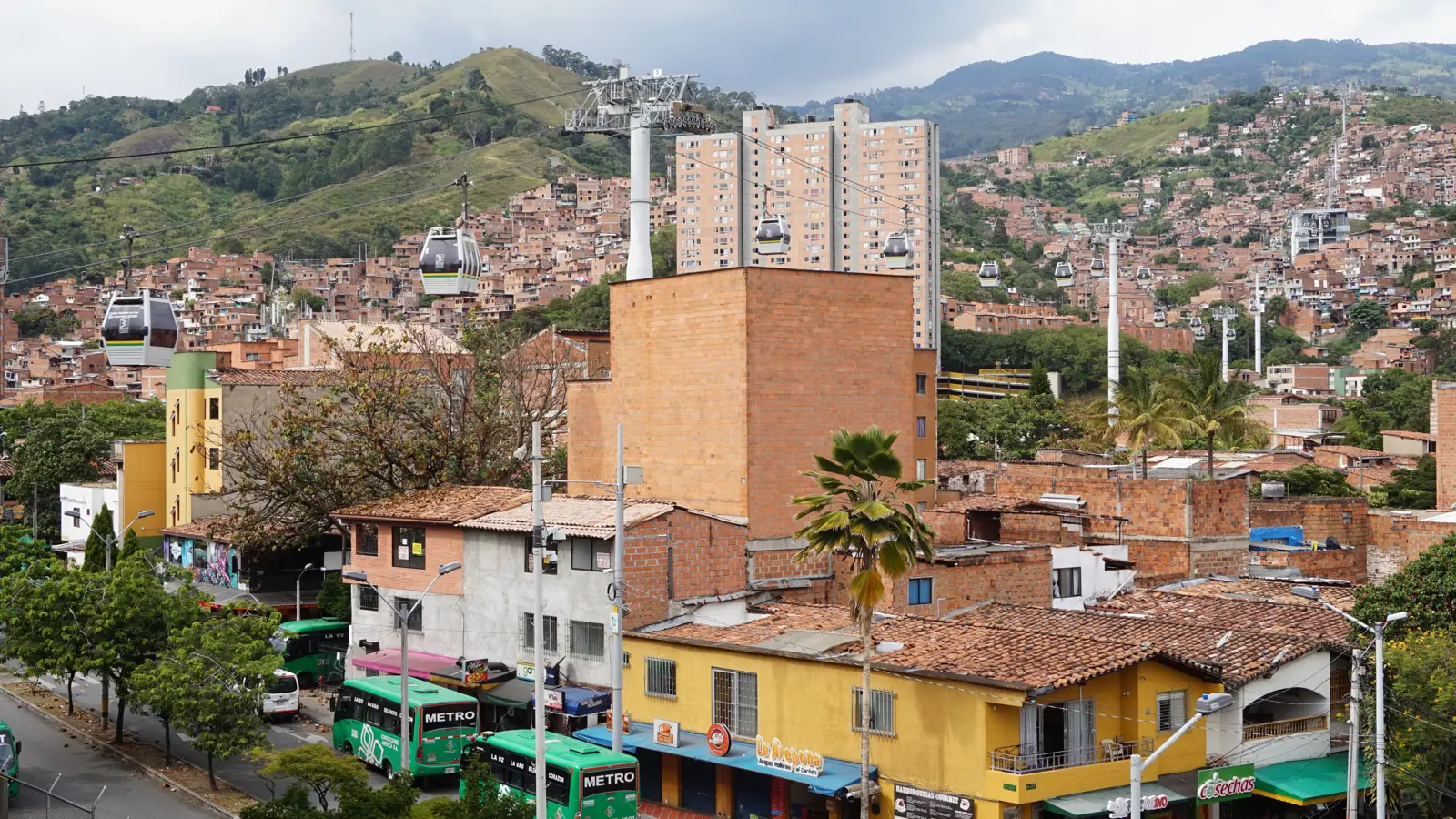 Metrocable Line J cabins above a street near San Javier station, Medellín
